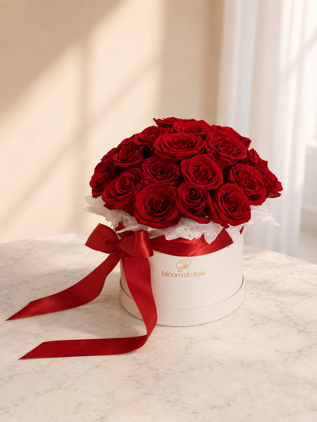 Roses Signature Box — deep red roses in white hat box with red satin bow, Gold Coast gift delivery